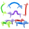 Detail of colorful dog-shaped pop tubes showing extended and compressed bellows design - Colorful Stretch Dog