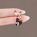 Exquisite golden cat brooch with black enamel and colorful patterns on a finger - 400# Cat