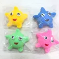 Set of four colorful starfish bath toys in yellow, blue, green, and pink colors - Bath Starfish 4pcs Set