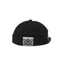 Dettaglio del cappello Miki nero in tela con toppa a forma di orso e cinturino regolabile - Regolabile / Orso Nero