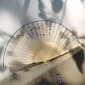 Exquisite silk folding fan with purple wisteria embroidery and elegant butterfly tassel - Wisteria
