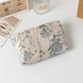 Detail view of jacquard floral makeup bag with vintage patterns and golden silk thread - Blue Hydrangea Jacquard (Medium)