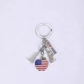 Silver New York metal keychain featuring Statue of Liberty and US flag apple charms - Apple Style