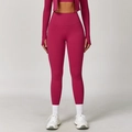 Women's magenta high-waisted yoga set with quick-dry leggings and long sleeve crop top - Rose Red