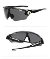 Detail view of sport cycling sunglasses featuring black glossy frame and TAC polarized lens - Black Frame Full Grey