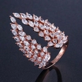 Close-up of rose gold wing ring featuring sparkling marquise-cut cubic zirconia stones - Adjustable Open / Rose Gold