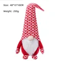 Weihnachtswichtel mit roter Strickmütze und Schneeflocken, 48 cm hohe Deko-Puppe - Rot