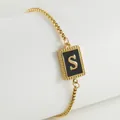 18K gold plated stainless steel box chain bracelet featuring a black enamel letter S pendant - Letter S (ZH497G-S-02)