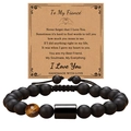 Detail of beaded bracelet with black onyx and tiger eye stone next to a greeting card - To My Fiancé