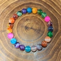 Handmade 8mm natural stone bracelet featuring colorful mixed crystal beads on a wood base - Multicolor Agate