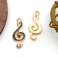 DIY treble clef music pendant in gold finish with black enamel and white zircon stone - Treble Clef (11907)