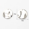 Macro detail of 19mm silver letter charm pendant with things to come engraving - Engraved Round / Silver