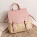 Pink leather and woven straw mini backpack with golden buckle and top handle detail - Pink