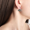 Silver irregular heart-shaped earrings featuring a deep green oval gemstone center - Silver Color Green Stone