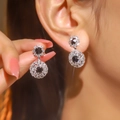 Élégantes boucles d'oreilles flocon en argent avec pierre noire et zircons brillants - Argent Noir