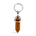 Detailed view of a hexagonal amber crystal pillar pendant attached to a silver keychain - Hexagonal Pillar Keychain / Transparent Coffee