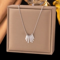 Elegant silver snake chain necklace with radiating geometric bar pendant on jewelry box - Bar Tassel / Steel