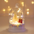 Close-up of glowing Christmas LED bell light with mini tree and festive ornaments inside - Style C (Warm Light)