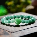 Green natural stone beaded bracelet with heart pendant on rustic wood texture - Heart Pendant / Green (Aventurine)