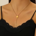 Y-shaped necklace with gold rose pendant and vertical bar tassel on female model - Rose Tassel Style / Gold Rose Necklace (4351)