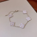 Close-up of a silver four-leaf clover bracelet with light blue inlays and lobster clasp - Silver Bracelet-Blue Clover