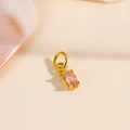 Detail of 18k gold pineapple pendant featuring pink cubic zirconia and polished finish - Pink Zirconia