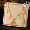 Fashion gold-plated knotted rope necklace with mixed floral, heart and sun pendants - Gold Braided Rope Multi-Pendant Style (N3516)