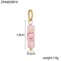 Macro shot of three pink natural stone beads on a 1.8cm gold pendant accessory - Pink Marble Pattern