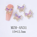 Macro detail of aurora butterfly nail charms with gold frame in 15x12.5mm size - Purple Aurora Gold Style (AN31)