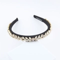 Detail of handmade baroque headband with sparkling leaf-shaped crystals on black fabric - Black with Silver Rhinestones