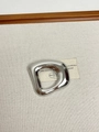 Detail view of a polished silver irregular D-shaped brooch on a linen textured background - 12 Silver Hollow Pin (XZ0011B)