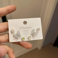 Macro shot of 925 silver stud earrings set featuring floral, butterfly and heart designs - 20# Green Butterfly (6 Pairs)