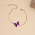 Macro detail of a gold chain necklace with a gradient blue-purple butterfly pendant - 12# Bracelet Deep Purple
