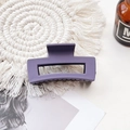 Detail of a purple matte rectangular hair claw clip on a white woven coaster - Medium Matte Square Claw-Purple Gray