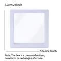 Detailed view of a 7cm white square jewelry display box with transparent PE film - 7x7cm Suspension Box / White