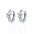 Macro detail of silver star huggie hoop earrings with sparkling white cubic zirconia stones - Pentagram / Silver