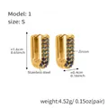 Golden U-shaped stainless steel earrings featuring gradient blue cubic zirconias - Small / Sapphire Blue