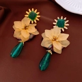 Detailed shot of vintage gold earrings with green teardrop pendants and floral accents - Vintage Flower Green Drop Embroidery Drop (24#)