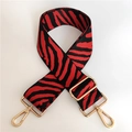 Detail of red and black zebra pattern replacement strap with gold metal hooks - Black Red