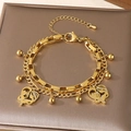 Double-layered golden stainless steel bracelet featuring hollow heart-shaped mother-child charms - Rhinestone Portrait Hollow Heart Style (KB203684-Z)