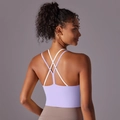 Detail view of lavender sports bra with cross-back straps for yoga and fitness training - S / Tops / Light Blue