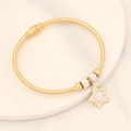 Detail of gold snake chain bracelet featuring a star charm with rhinestones and white shell - Star (4#)