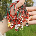 Handmade Christmas bracelet set with Santa and reindeer charms in red and green colors - Christmas Woven Bracelet 1pc