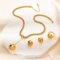 Golden titanium steel jewelry set featuring a necklace, earrings and ring on stone - Set 3-Solid Hemisphere