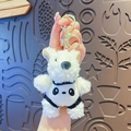 Cute white Westie plush keychain wearing a black and white panda costume with gold clasp - Panda