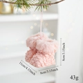 Macro shot of pink plush Christmas boot ornaments with detailed furry texture and soft feel - Pink Boots Star