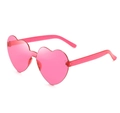 Detail of pink heart-shaped rimless sunglasses in one-piece transparent resin material - Rose Red