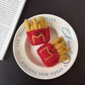 Handmade wool felt French fries keychain charm in red and yellow with cute smiley face - French Fries