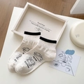 Off-white Cartoon-Hundesocken mit schwarzen Rippbündchen und Peace-Textdesign - Cremeweiß Hund