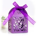 Detailed view of purple laser-cut candy box with heart patterns and satin ribbon bow - Dark Purple